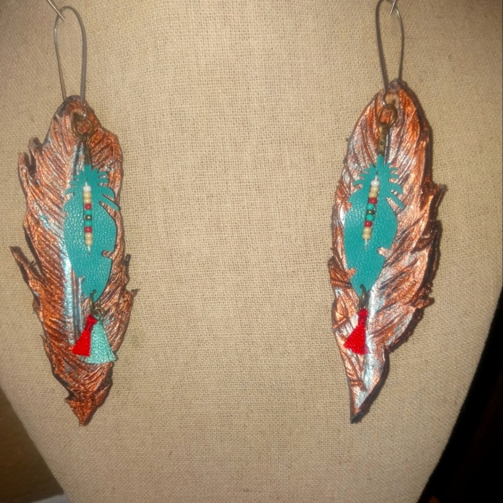 Leather tooled Earnings